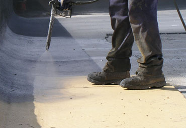 coating systems over London spray foam roof systems